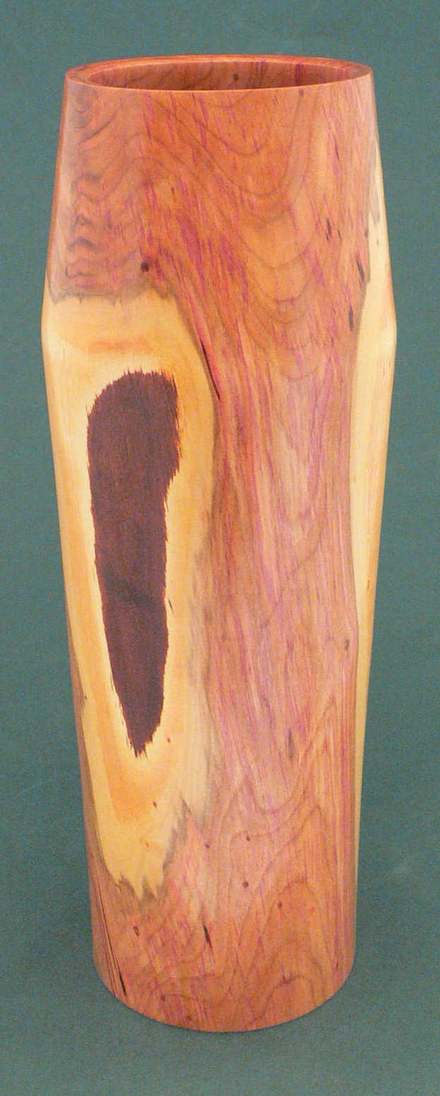 Image showing an example of a plum hollow form vessel Image showing an example of a plum hollow form vessel