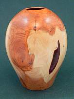 Wood art by Chris Rymer of Inside Out Wood Art made from - 
      Yew