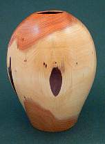 Wood art by Chris Rymer of Inside Out Wood Art made from - Yew