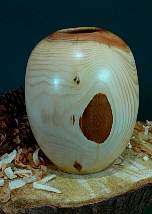 Wood art by Chris Rymer of Inside Out Wood Art made from - 
      Yew