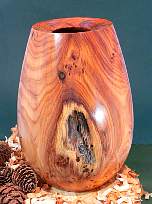 Wood art by Chris Rymer of Inside Out Wood Art made from - 
      Yew